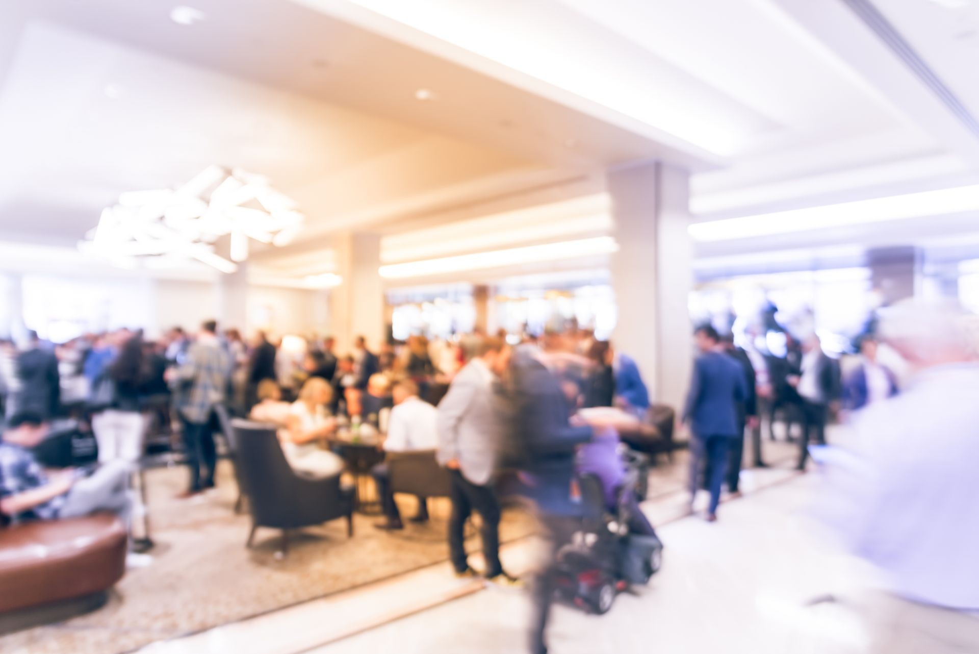 Vintage tone blurred motion people have happy hour, casual business meeting at the lobby of luxury hotel in San Francisco, California, USA. Blurry abstract background industry networking event
